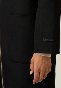 Oltre Halflange jas - nero