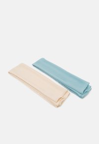 Two folded fabric scarves, one cream and one light blue, made of smooth, lightweight material. Each measures approximately 20 cm wide and 100 cm long.