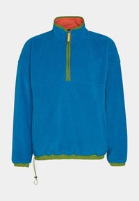 Sininen fleece-pullover, jossa on puoli-vetoketjukaulus, vihreät yksityiskohdat ja elastinen helma. Kauluksen sisäosa on oranssia vuorikangasta. Sivutaskut mukana.