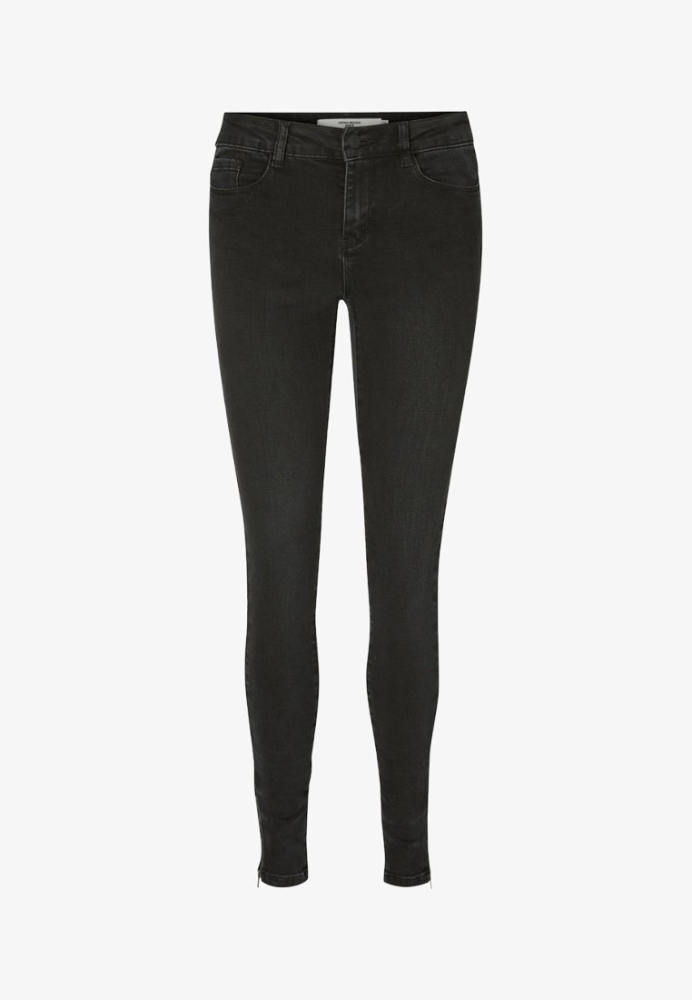 Jeans ajustados negros de mezclilla con una textura suave, que cuentan con cremallera, cuatro bolsillos y un diseño ceñido.