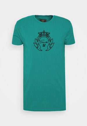 Türkisfarbenes Kurzarm-T-Shirt mit Rundhalsausschnitt, schwarzer bestickter Krone und Lorbeerkranz-Design sowie Markenname auf der Brust.