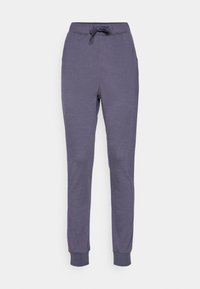 Lila Jogginghosen aus weichem Material, mit elastischem Bund und verstellbarem Kordelzug. Die Bündchen an den Knöcheln runden das Design ab.