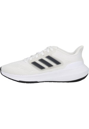 Weißer Sportschuh mit atmungsaktivem Mesh-Obermaterial, drei schwarzen Streifen, Schnürverschluss, gepolsterter Sohle und strukturiertem Gummiaußensohle.