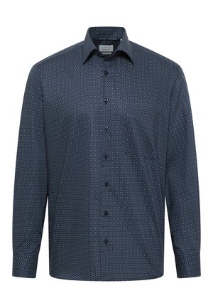 Dark blue long-sleeve button-up shirt with small white polka dots and a classic collar visible on a white background.