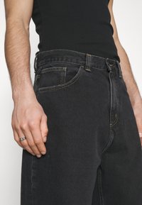 Carhartt WIP Vaqueros baggy - black denim