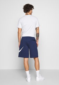 Nike Sportswear SPORTSWEAR CLUB - Treniņtērpa apakšdaļas - midnight navy/white