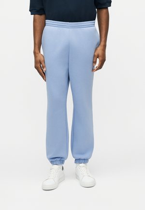 - Spodnie treningowe