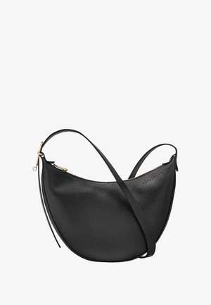 Black leather shoulder bag with a curved shape, textured finish, slim strap, and gold-tone hardware detail at the zipper.