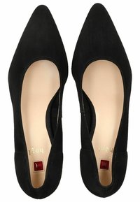 Black suede high-heeled shoes with pointed toes, curved cutouts on the sides, and a small red accent near the heel. Smooth inner lining.