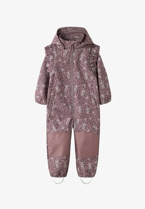 Lilla blomsterprintet vandtæt jumpsuit med flæsedetaljer, fuld lynlås foran, elastiske manchetter og forstærkede knæpartier i ensfarvet.