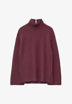 Burgundy knit turtleneck sweater with ribbed cuffs and hem, featuring a high collar and an asymmetrical bottom edge for added texture.