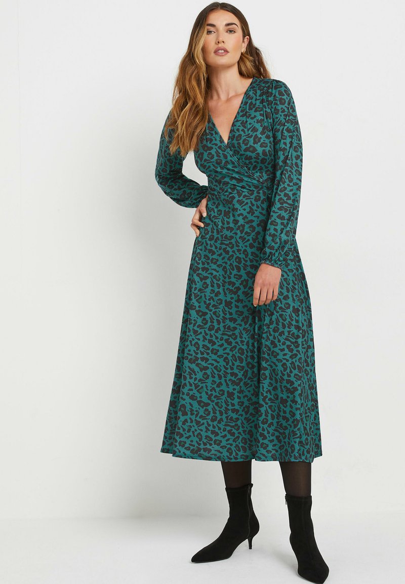 slim fit dress slacks Threadbare Women's Green Leopard Print Frill Hem Ladies' Midi Wrap Dress