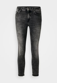 Slim-fit jeans i en falmet sort vask, med fem lommer, lynlås og rå kant. Lavet af denim med en glat tekstur.