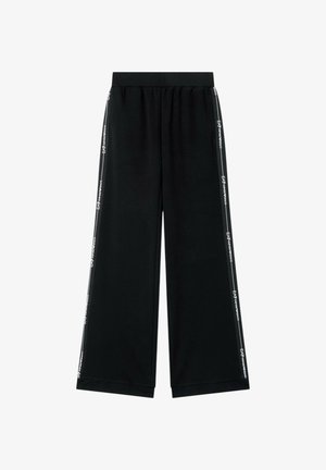 Pantaloni neri a gamba larga con vita elastica e strisce con il logo bianco EA7 Emporio Armani che corrono lungo ogni cucitura laterale.