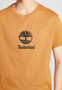 Timberland Camiseta estampada - camel