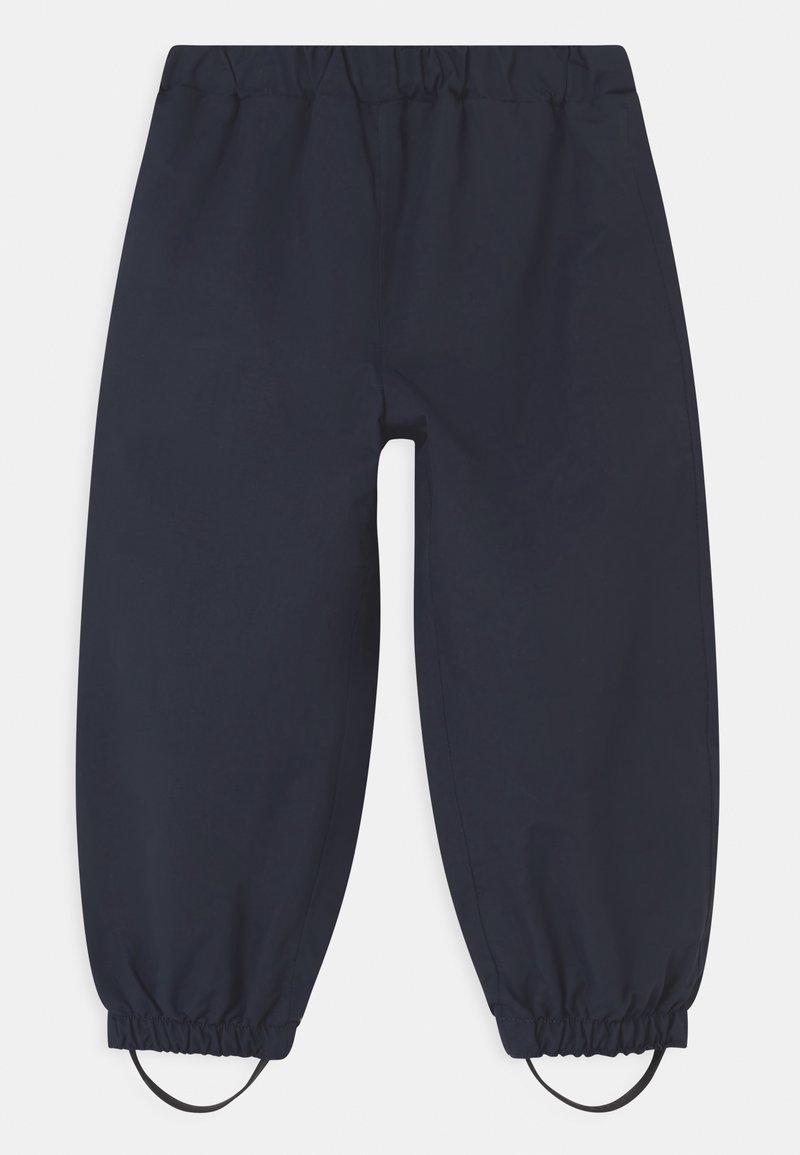 Pantalon bleu marine à taille élastique avec poignets élastiques et sangles noires pour les pieds, conçu pour un ajustement sûr et une utilisation active.