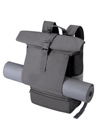 Gray backpack with a roll-top design, buckle closure, two adjustable straps, and a side compartment holding a gray yoga mat.