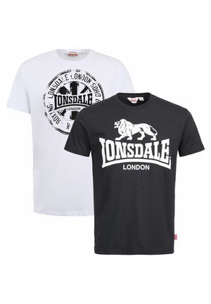 Two t-shirts: white with a circular printed logo and black featuring a lion graphic and "LONSDALE LONDON" in white text. Cotton material.