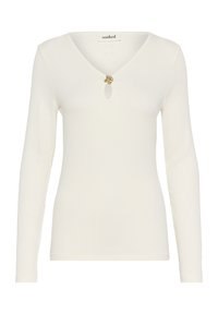 Bluză cu mâneci lungi, de culoare crem, cu decolteu în V și un detaliu decorativ cu buton auriu la piept. Material moale și texturat.