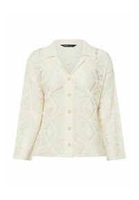 Stickad kofta i krämfärg med ett mönster i diamantform och öppet arbete, med krage och knappstängning; långa ärmar med ribbade muddar.