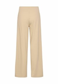 Beige wide-leg trousers, made of soft fabric, featuring a smooth waistband and flowing design. No pockets or visible embellishments.
