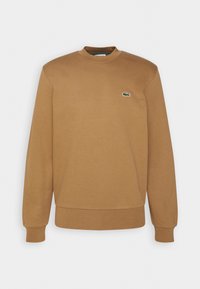 Sudadera marrón de algodón, con cuello redondo, mangas largas, puños y bajo acanalados, con un pequeño logo verde en el pecho.