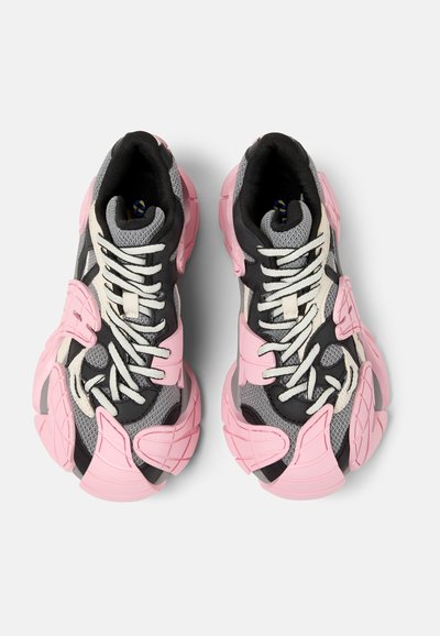 Sport shoes featuring a black and gray mesh upper, pink rubber accents, thick soles, and white laces with a unique structural design.