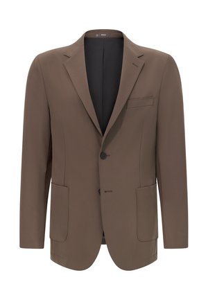 Ruskea bleiseri, joka on valmistettu sileästä kankaasta. Siinä on yksi nappisuljenta, viistereunaiset lapelit, kaksi etupocketsia ja yksi rintatasku.