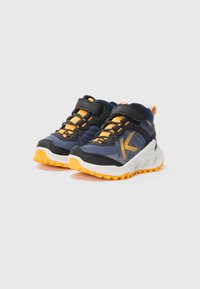 Navy and black athletic shoes with orange accents. Mesh upper, sturdy black sole, and adjustable strap. Textured rubber outsole for grip.