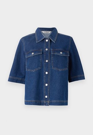Jachetă din denim de culoare albastru închis, cu mâneci scurte, două buzunare pe piept, capse argintii și guler.