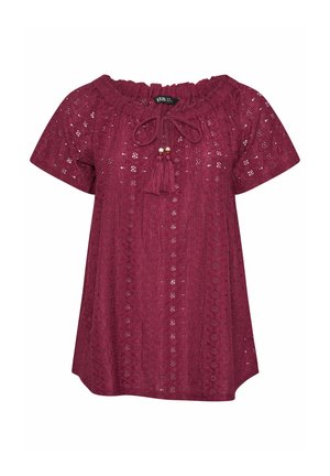 Blouse bordeaux à manches courtes en œillet avec encolure froncée et liens à pompons, présentant des motifs floraux et géométriques.