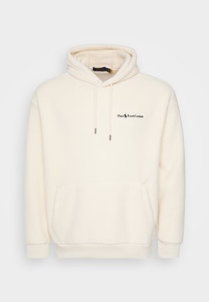 Krēmkrāsas flīsa džemperis ar kangura kabatu, kapuci ar aizskrūvi un nelielu tumši zilu izšūtu reklāmas zīmi uz krūtīm.