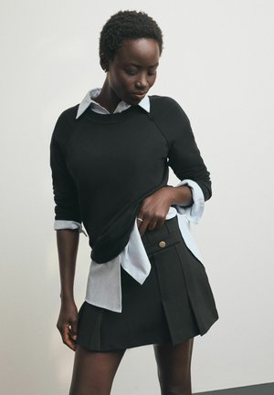 Next, PONTE PLEATED MINI SKIRT WITH GOLD BUTTON DETAILING - Mini skirt - black