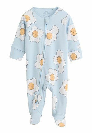Niebieski niemowlęcy kombinezon z wzorem uśmiechniętych sadzonych jajek. Wykonany z miękkiego materiału, ma długie rękawy, zabudowane stopy oraz zamek z przodu.