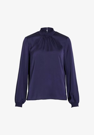 Blusa blu navy in tessuto liscio, con collo alto arricciato e maniche lunghe con polsini arricciati. Taglio dritto con vestibilità ampia.