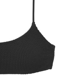 Black bikini top made of textured fabric, featuring a knitted design with thin adjustable straps and a triangular shape.
