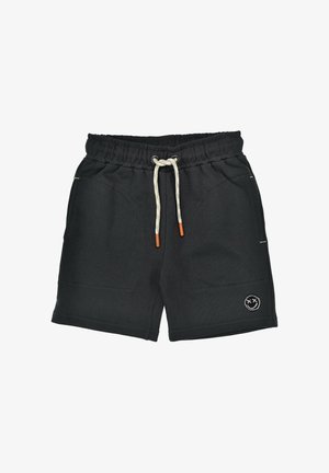 Black elastic waist shorts with white drawstring and small stitched smiley face logo near hem on the left leg.