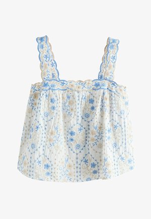 Hvid ærmeløs bluse med blåt og beige blomsterbroderi og bølget kant på stropper og halsudskæring.