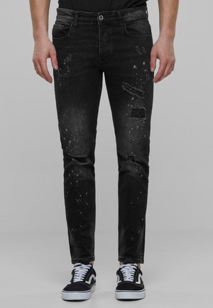 TAPERED FIT - Slim fit jeans - black