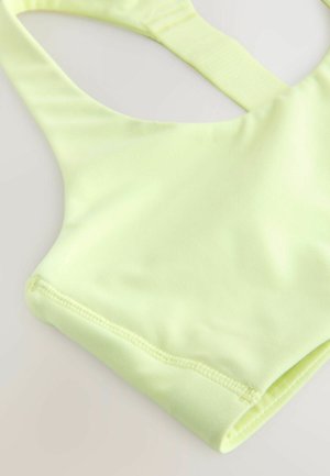 Next, REGULAR FIT - T-BACK MEDIUM IMPACT SPORTS BRA . - Bustier  - yellow