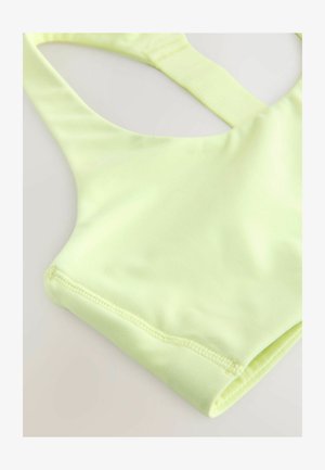 Next, REGULAR FIT - T-BACK MEDIUM IMPACT SPORTS BRA . - Bustier - yellow