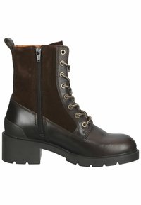 Bottine en cuir et daim marron avec un bout rond, des œillets métalliques, des lacets contrastants, une fermeture éclair latérale et une semelle en caoutchouc épaisse.