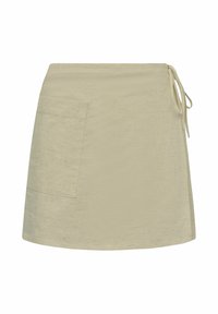 Beige Baumwollmischung Rock mit seitlichem Taschen, gebundenem Taillenbund und leicht strukturiertem Finish, mit geradem Saum und minimalistischem Design.