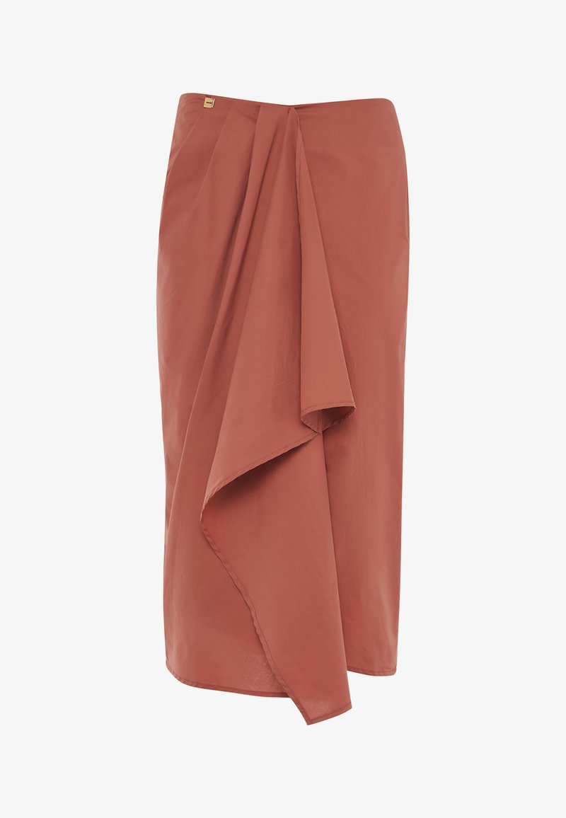 Rust-colored midi skirt crafted from smooth fabric, featuring a draped design, asymmetric hem, and subtle branding detail at the waist.