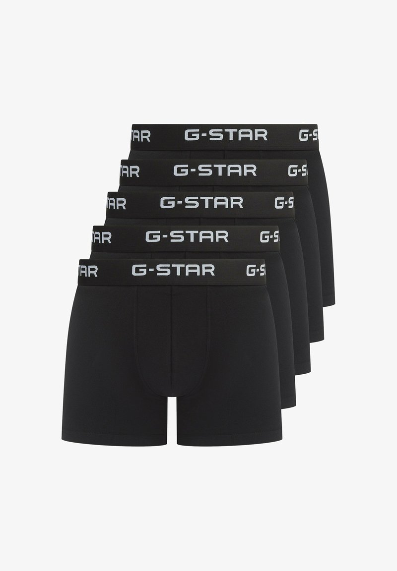 Zwarte boxershorts in een verpakking van vijf. Gemaakt van een soepel materiaal met een zwarte tailleband waarop het "G-STAR" logo in het wit is afgebeeld.