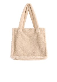 Borsa tote beige realizzata in materiale morbido e soffice. Presenta due manici robusti, forma rettangolare e una superficie testurizzata senza hardware visibile.