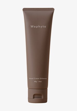 Tube marron de crème pour les mains Waphyto Enhance, 40 g 1,4 oz, avec bouchon à clapet sur fond blanc uni.