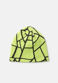 Bonnet tricoté vert néon brillant avec un motif géométrique noir, présentant une texture lisse et un dessus effilé.