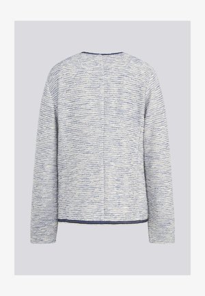 Leichte, strukturierte Jacke mit einem sprenkelten blau-weißen Muster. Mit langen Ärmeln und einem abgerundeten Halsausschnitt mit sauberem Finish.