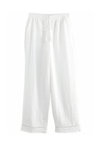 Pantalons en lin blancs avec une taille élastique, fermeture à cordon, poches latérales et coutures décoratives à l'ourlet. Design à jambes larges.